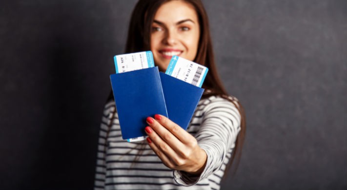 foreign student holding two passports